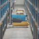 Scalability and Flexibility in the AirRob Robotic Tote Handling System